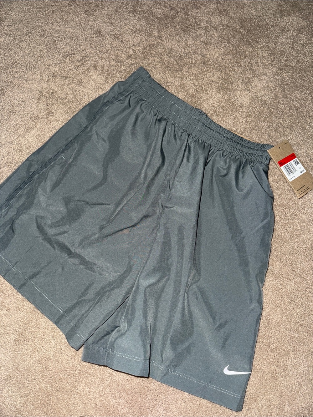 Nike Dark Gray Athletic Shorts with White Swoosh